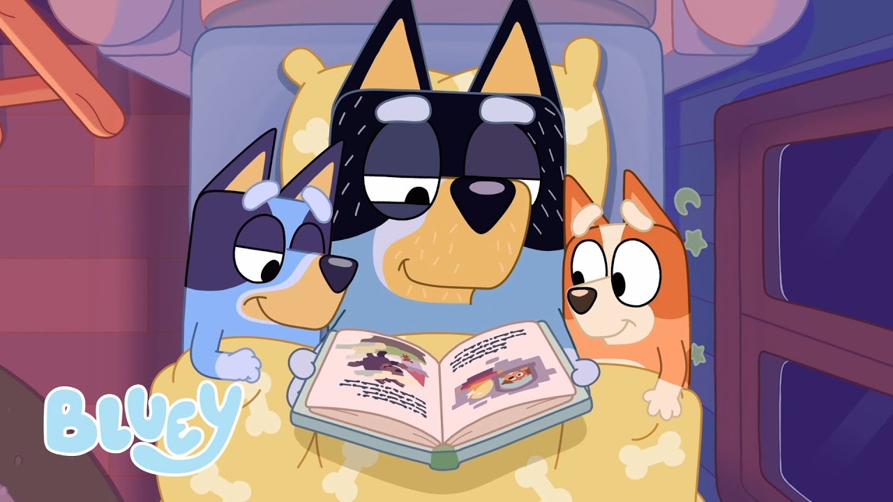 Bandit reading to Bluey and Bingo