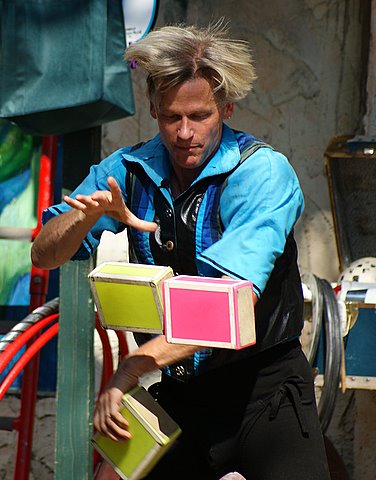 Brian Wendling juggles books.