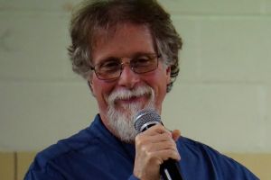 Close up of Ric Vice, microphone in hand.