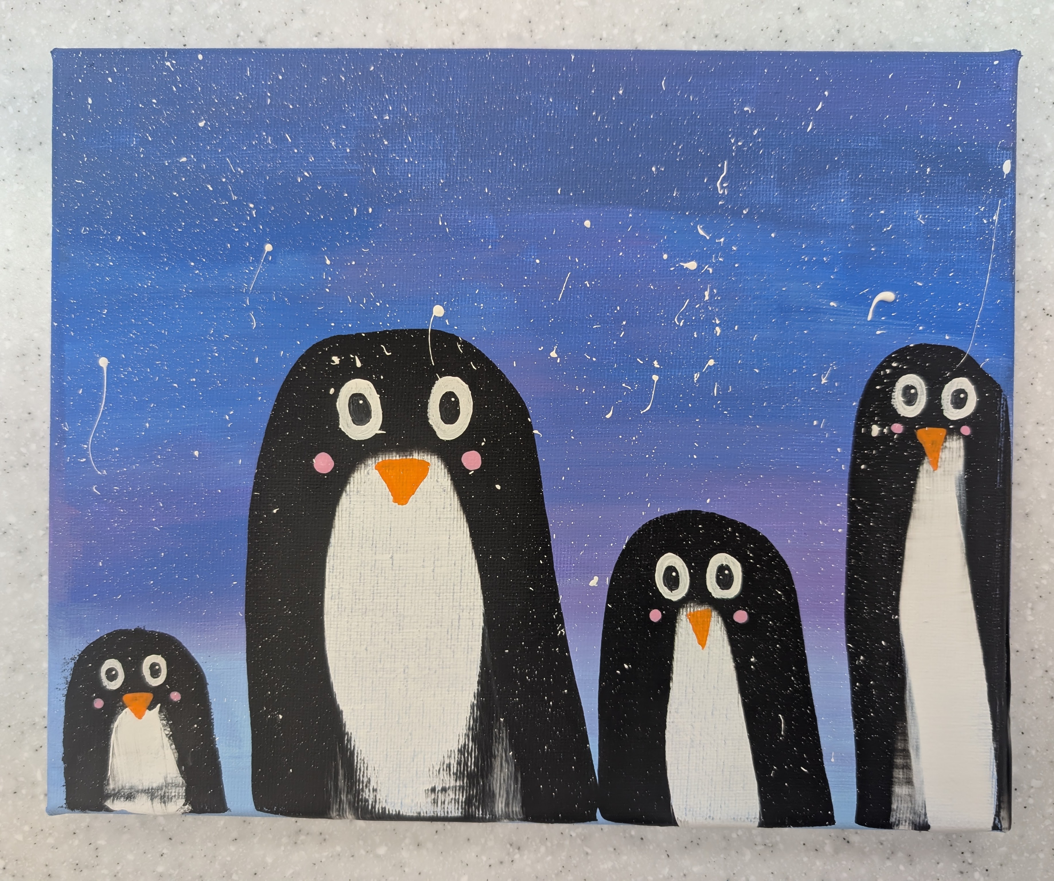 Penguins painted with a squeegee on a wintry background.