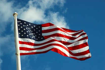 an American Flag waving in the wind