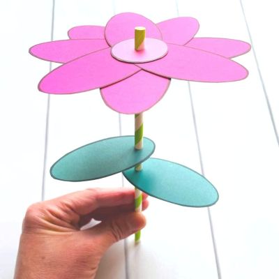 Paper flower with a straw stem