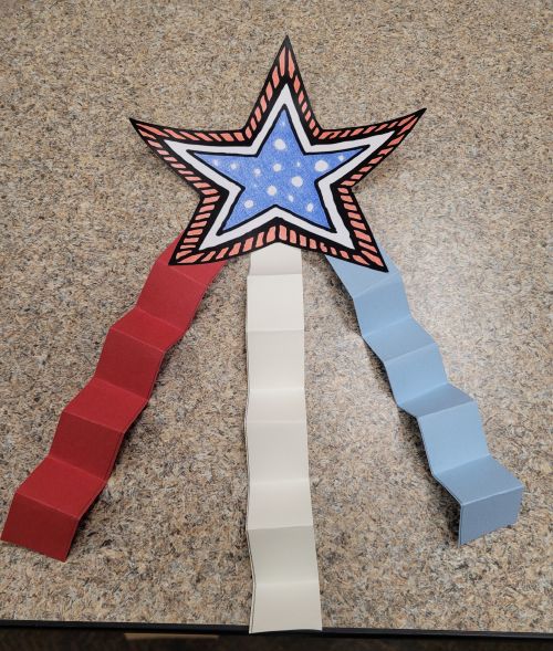 red white and blue paper star