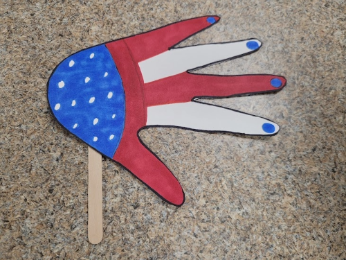 A handprint colored in red white and blue