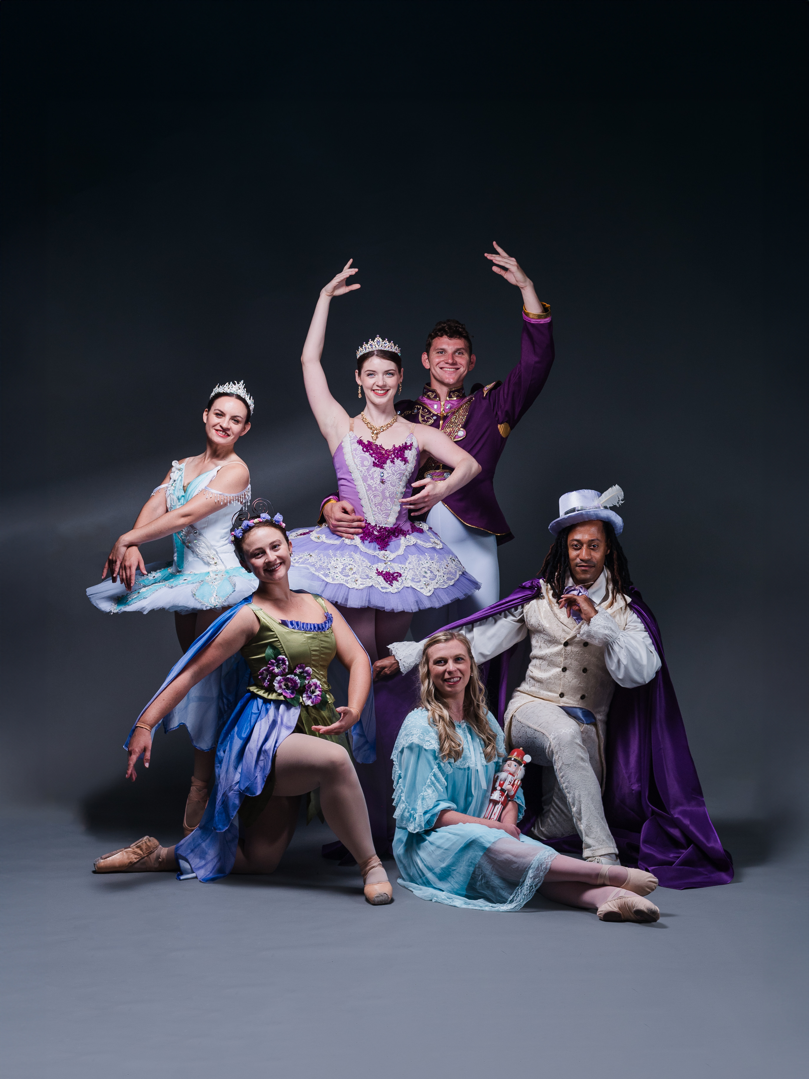 Ballet dancers pose on the stage