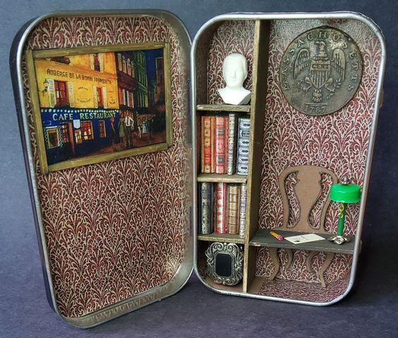 Altoid tin can made to look like small library. 