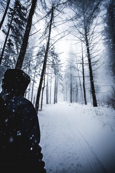 Man in Winter Coat is Caught in a Blizzard