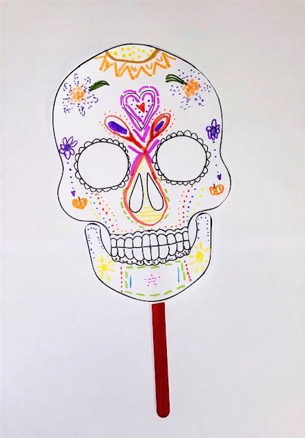 picture of the craft,  a skull with art on the paper