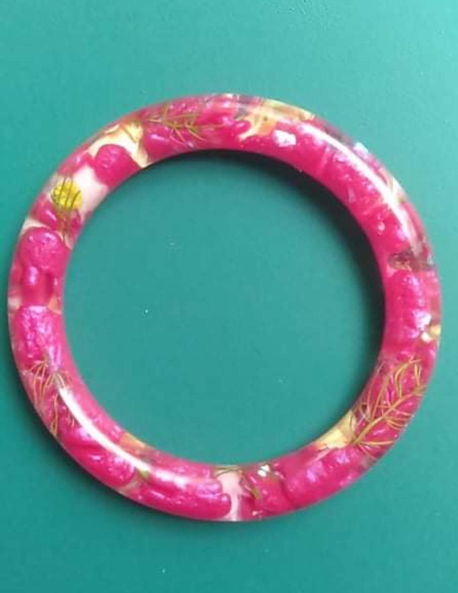 resin bracelet with dried flowers inside