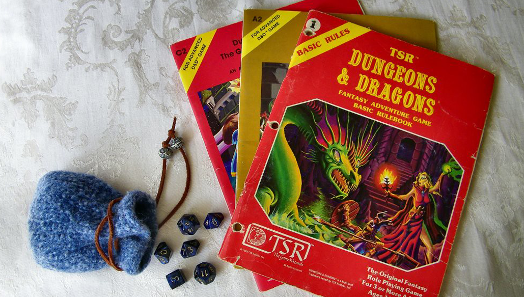 Dungeons and Dragons Manual with dice