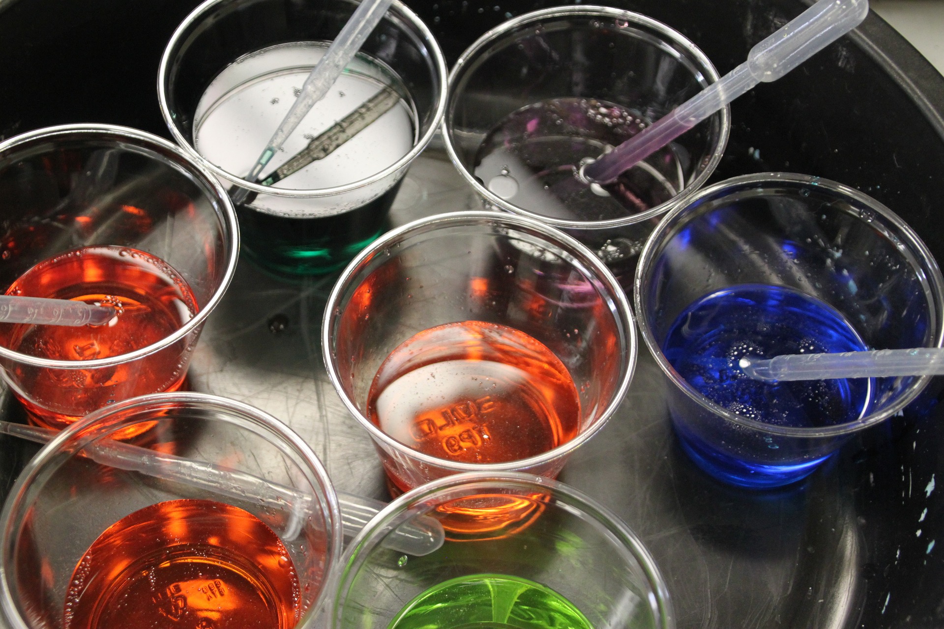 colored liquid in beakers