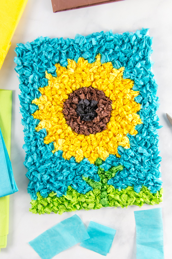 Image of a sunflower art project created using tissue paper.