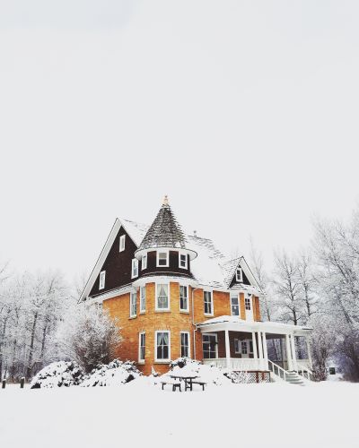 an inn covered with snow