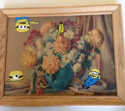 Minions hanging around some flowers