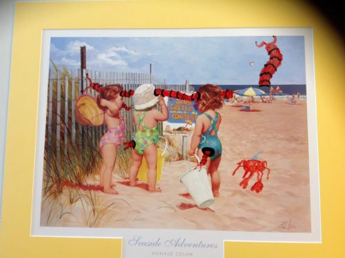 A sea monster added to a beach painting.