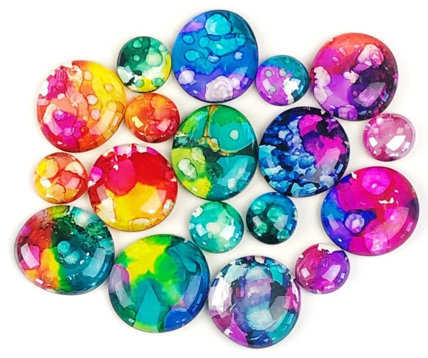 Image showing a group of gems decorated using alcohol ink.