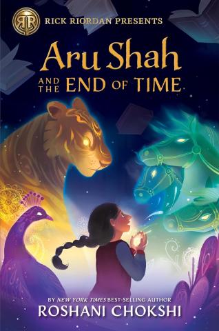 A young Indian girl holds a golden orb. She is surrounded by colorful spirt animals: a tiger, a peacock, and a herd of horses.