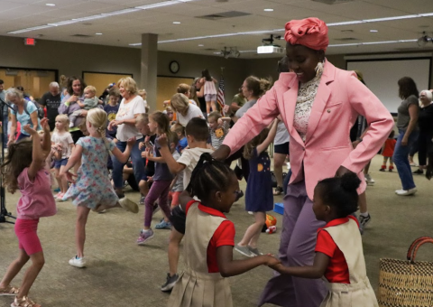 Families dance to music