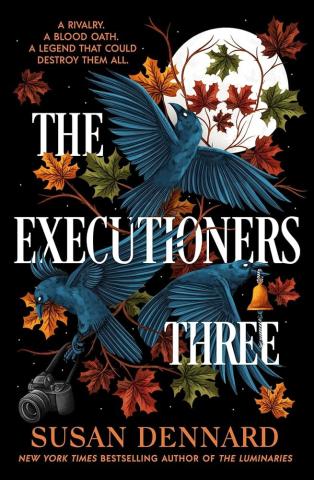 A book cover with an image of a full moon, fall leaves, and three crows. One crow is holding a bell in its beak and another is holding a camera in its talons. The title, The Executioners Three, is superimposed over the image of the birds and leaves.