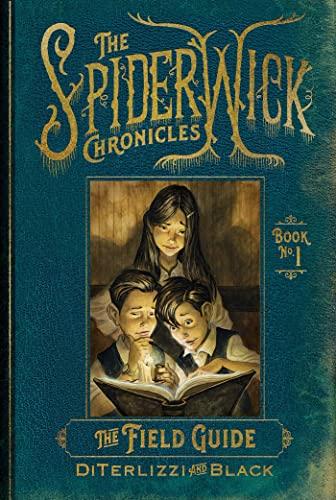Two boys and one girl examine an old book